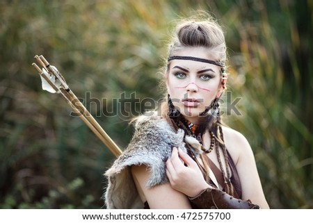 Beautiful Amazon forest with bow and arrows on his shoulders