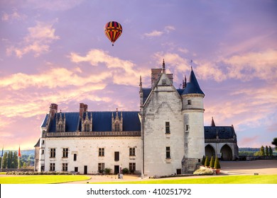 Beautiful Amboise castle on the Loire river with air balloons flying above him, UNESCO World Heritage Site