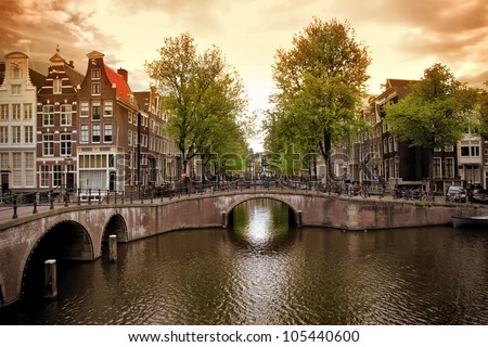 Beautiful Amsterdam canals with typical houses