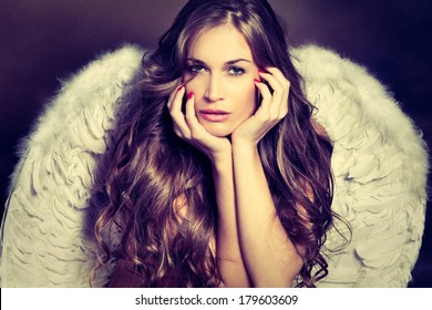 beautiful angel woman with white wings