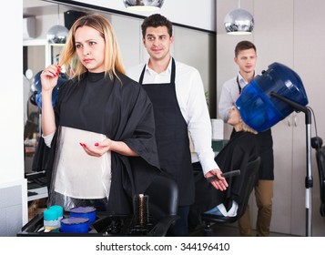 Beautiful Angry Woman Blaming Hairdresser In Bad Haircut 