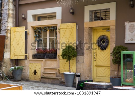 Beautiful antuque european old city exterior with yellow design 