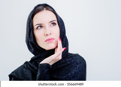 Beautiful Arab Woman Looking Forward Isolated On Grey Background. 