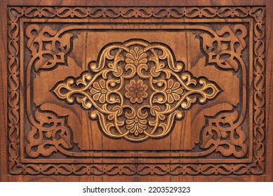 Beautiful Arabic patterns carved from wood on the door. Oriental architectural design.