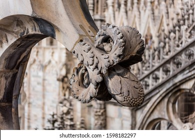 Beautiful architectural details with statues on the top of  building of the Milan Cathedral (Duomo di Milano), the cathedral church of Milan, Lombardy, Italy. Dedicated to the Nativity of St Mary.