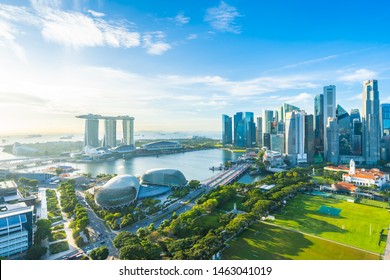 Beautiful architecture building exterior cityscape in Singapore city skyline with white cloud on blue sky
