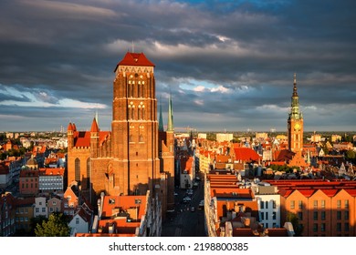 Beautiful Architecture Of The St. Marys Basilica Of Gdansk In The Rays Of The Setting Sun. Poland