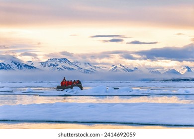 Beautiful arctic landscape view with people in a inflatable boat