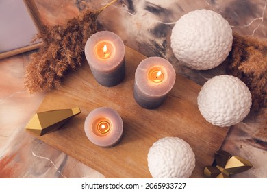 Beautiful aroma candles with decor on table - Shutterstock ID 2065933727