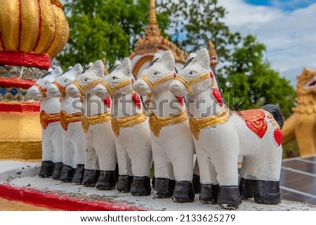 A beautiful art miniature horse doll inside the sacred Phra Borommathat Temple, Ban Tak District, Tak Province, Thailand.
