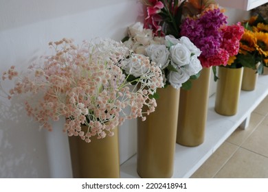 Beautiful artificial flowers in pots