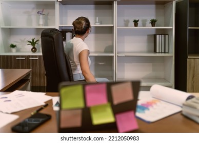 Beautiful Asian Business Woman Looking Objects. Female Worker Person Turn Back Find Item For Using In Office Job. Woman Searching For Something In The Back On Cabinet Or Container To Use In Workplace.