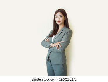 Beautiful Asian Business Woman Standing Still In Clean Background