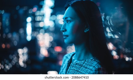 Beautiful Asian Female Portrait Standing On City Street With Neon Lights Late In The Evening. Authentic Adult Confident Woman Posing For Camera, Smiling In The Night On Downtown Business Street.