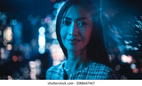 Beautiful Asian Female Portrait Standing On City Street With Neon Lights Late In The Evening. Authentic Adult Confident Woman Posing For Camera, Smiling In The Night On Downtown Business Street.