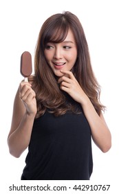 Beautiful Asian Girl With Big Eyes  Eating Or Holding  A Ice Cream On White Background