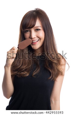 Beautiful asian girl with big eyes  eating or holding  a ice cream on white background