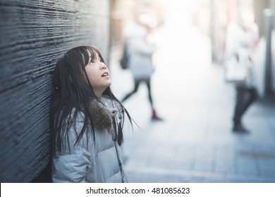 Beautiful Asian Girl Looking Up On Street,Gion Kyoto Japan