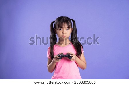 beautiful asian girl portrait posing on purple background