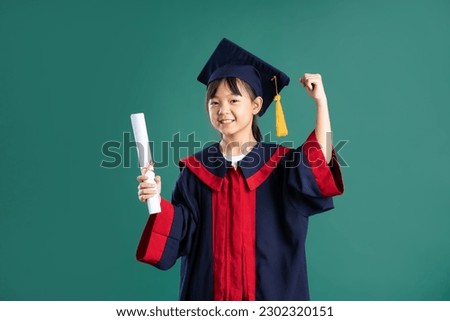 beautiful asian girl posing on blue background
