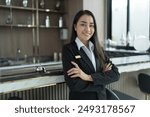 Beautiful asian hotel receptionist in  uniforms at desk in lobby Friendly and welcome staff in hotel reception counter