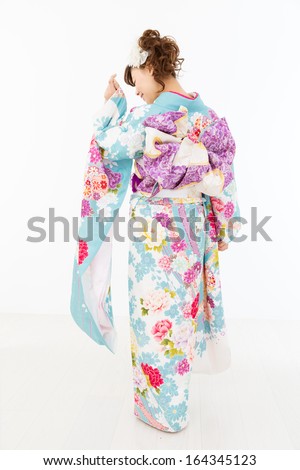Beautiful asian kimono woman on white background 