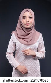 Beautiful Asian Malay Lady With Hijab And Isolated Background.