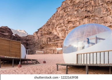 Beautiful Asian Tourist Woman Posing In Bubble Tents At Wadi Rum Desert, Jordan