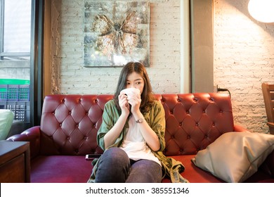 Beautiful Asian Woman With Coffee In Vintage Coffe Shop