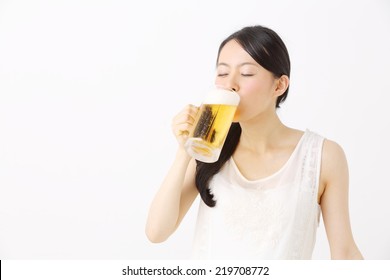 Beautiful Asian Woman Drinking A Beer