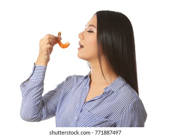 Beautiful Asian Woman Eating Shrimp On White Background