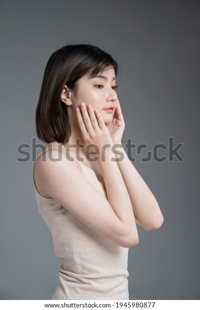 My asian girlfriend rubbing her bun
