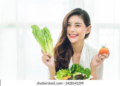 Beautiful Asian Woman With Healthy Food. Heathy Life Style And Beautiful Skin Care Food Concept.