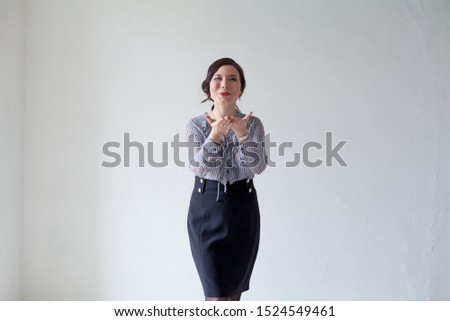 Similar – young beautiful lady posing in the living room next to a window