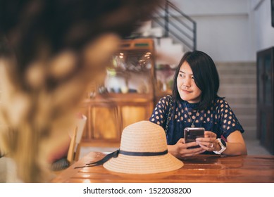 Beautiful Asian Woman Sitting In Cafe,Happy And Smiling,Positive Thinking