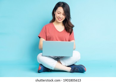 Beautiful Asian Woman Sitting Working With Laptop
