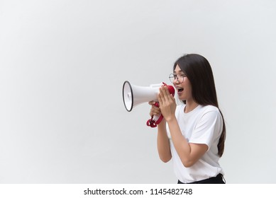 Beautiful Asian Woman With Speaker In Hand On White Background,angry Woman Concept,Thailand People