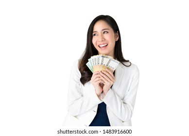 Beautiful Asian Woman Thinking And Smiling While Holding South Korean Won Money In Hands Isolated On White Background