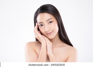 Beautiful Asian woman touching soft cheek smile with clean and fresh skin Happiness and cheerful with positive emotional,isolated on white background,Beauty Cosmetics and spa facial treatment Concept