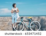 Beautiful Asian woman with vintage bicycle and vintage camera,travel concept 