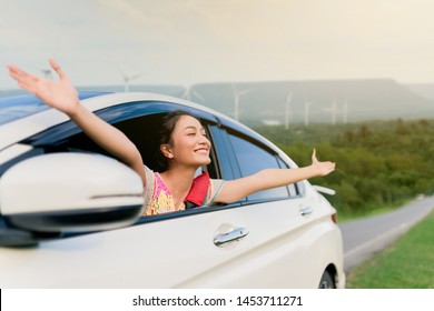 Beautiful Asian Women Feeling Fresh And Happy In White Car