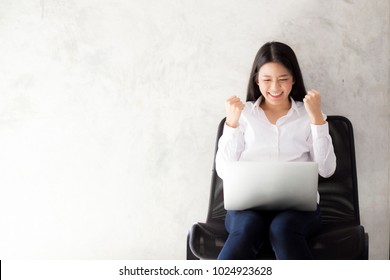 Beautiful Asian Young Woman Excited And Glad Of Success With Laptop, Girl Working Coffee Shop On Cement Background, Career Freelance Business Concept.
