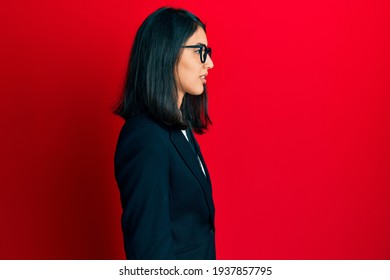 Beautiful Asian Young Woman Wearing Business Suit Looking To Side, Relax Profile Pose With Natural Face With Confident Smile. 