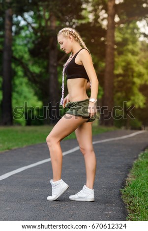 Similar – Happy fit woman taking a break from jogging