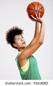 Beautiful Athletic Woman With Basketball. Studio Shot.