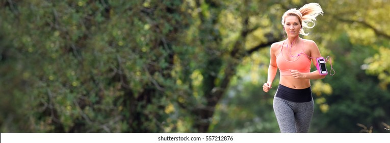 Beautiful Athletic Woman Running In Forest