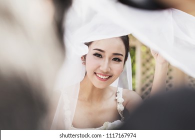 https://image.shutterstock.com/image-photo/beautiful-attractive-asian-bride-wearing-260nw-1117167974.jpg