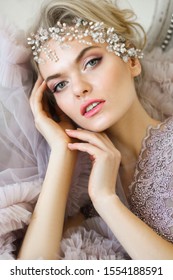 Beautiful Attractive Blond Hair Girl Fashion Portrait. Young Bride Wearing Wedding Dress And Make Up And With Wedding Hairstyle Close Up Boho Style