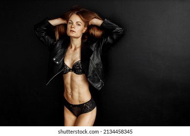 Beautiful Attractive Lady Posing In Studio, Wearing Black Underwear, Gorgeous Woman Have A Slim Sporty Shape, Motivate To Daily Workout, Keep Fit, Beauty And Womanhood Concept. High Quality Photo