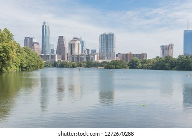 Beautiful Austin, Texas State Capitol from Colorado River nature area with people on kayaking and stand up paddle - Shutterstock ID 1272670288